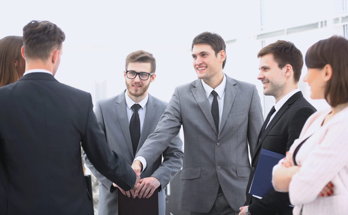 Handshake business partners before business meeting